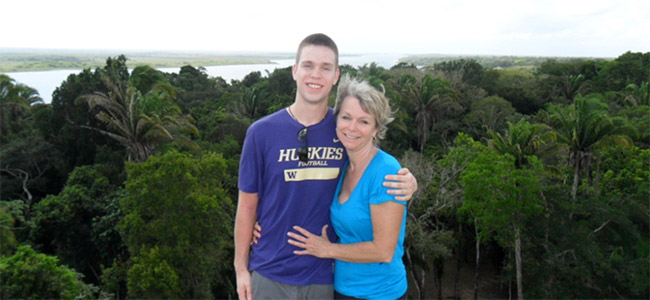 Ouida James and son, Travis, atop High Temple at Lamanai