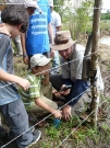 KidsEcoclub out checking camera traps, with LFRC intern, Matt Thornton